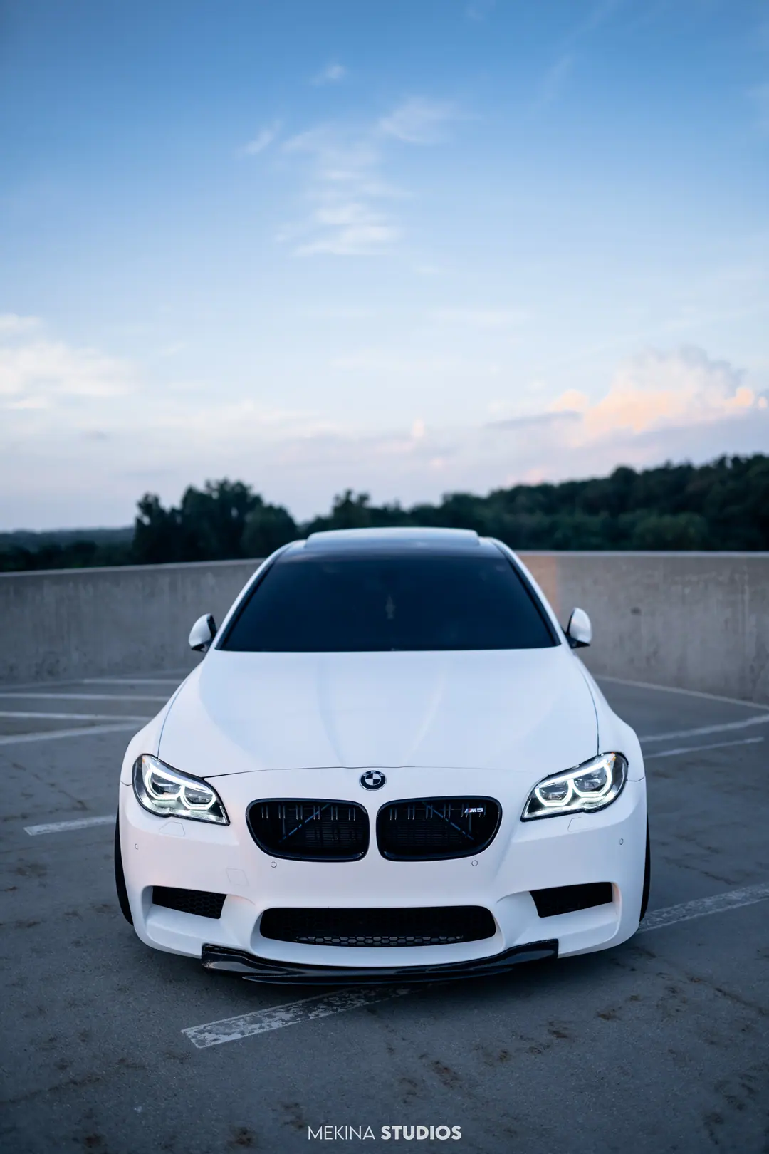 2014 BMW M5 — Wrap in Matte White Metallic — frame 2