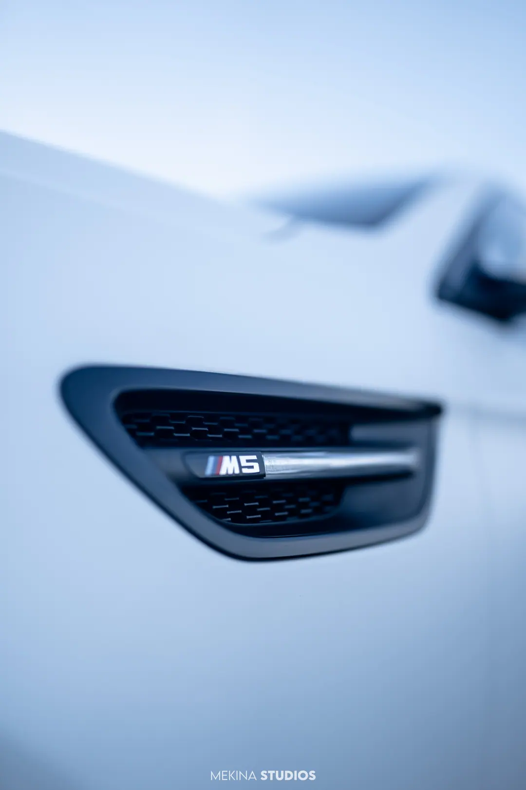 2014 BMW M5 — Wrap in Matte White Metallic — frame 4